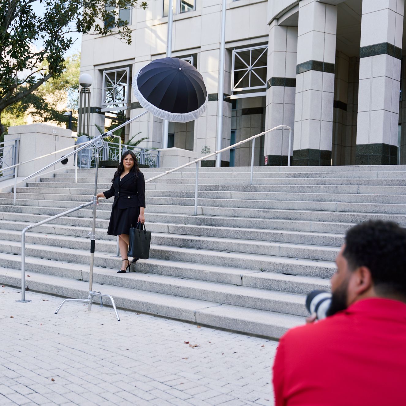 Gerson photographing a client on location in downtown Orlando
